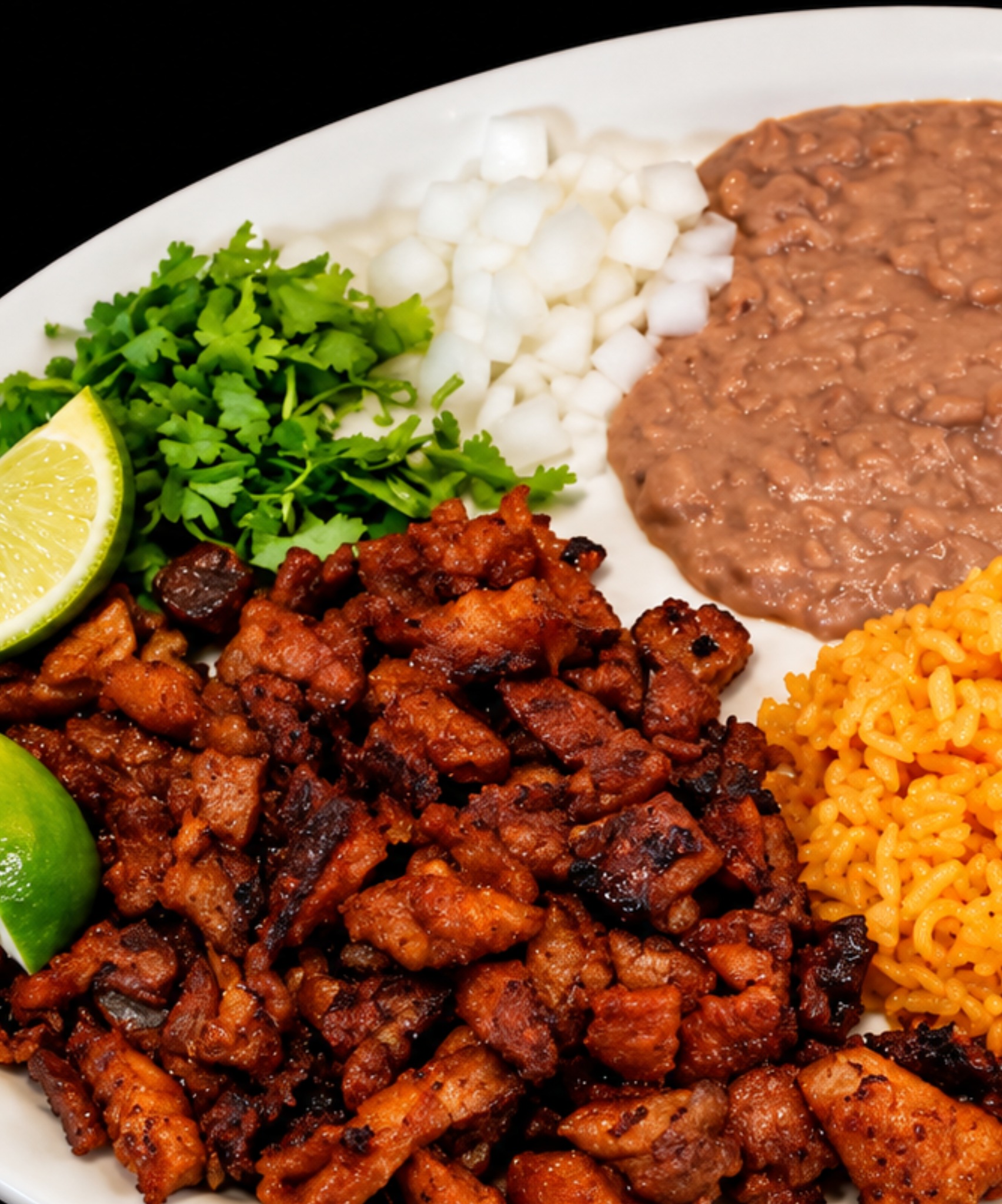 Meat plate served with rice and beans